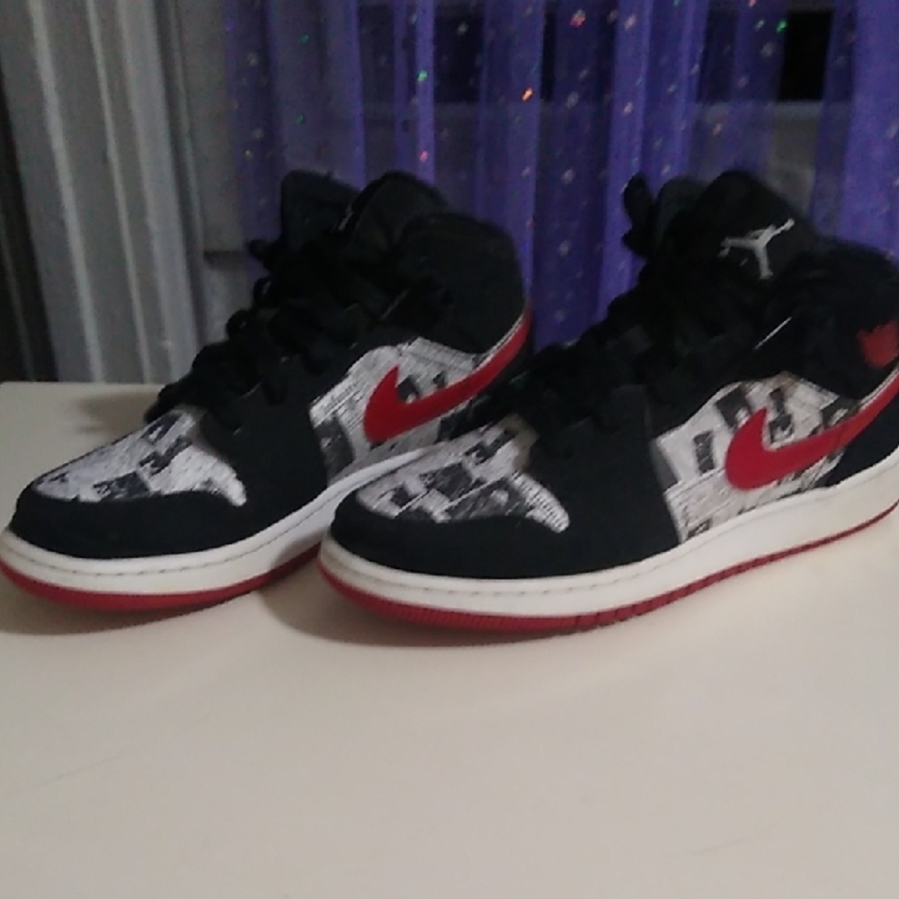Jordan 1s Newspaper Black and Red High-Top Sneakers